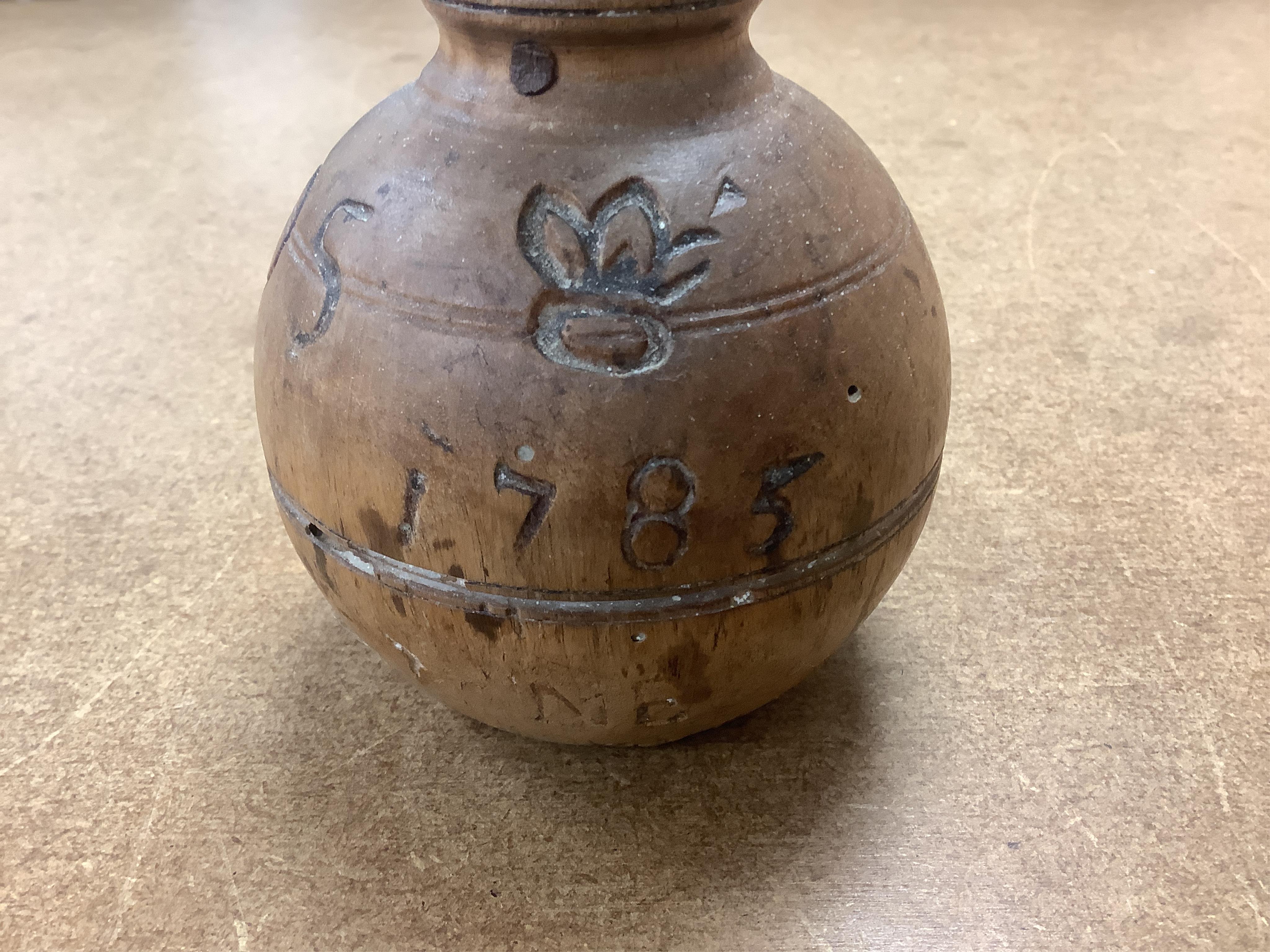 An 18th century French fruitwood weight/measure, 73cm. Condition - fair to good